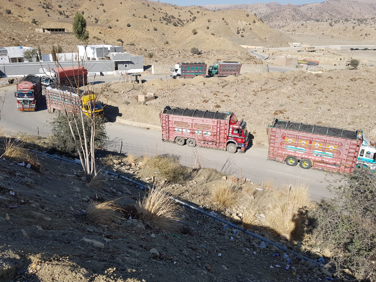 In this file photo, trucks with freight from Pakistan are seen crossing the Ghulam Khan border with Afghanistan. (AN photo)