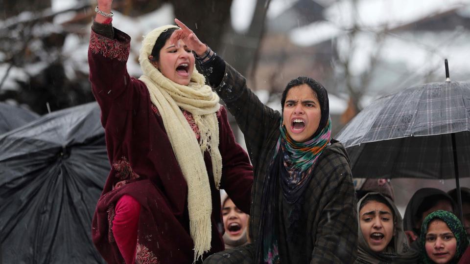 Kashmiri women shout pro-independence slogans during the funeral of top rebel commander Umar Fayaz in village Tral, south of Srinagar, India-administered Kashmir, Monday, Jan 13, 2020. (AP)