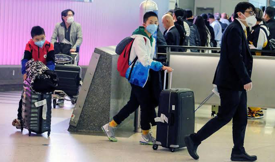 Passengers arrive at LAX from Shanghai, China, after a positive case of the coronavirus was announced in the Orange County suburb of Los Angeles, California, U.S., January 26, 2020. (File/ Reuters)