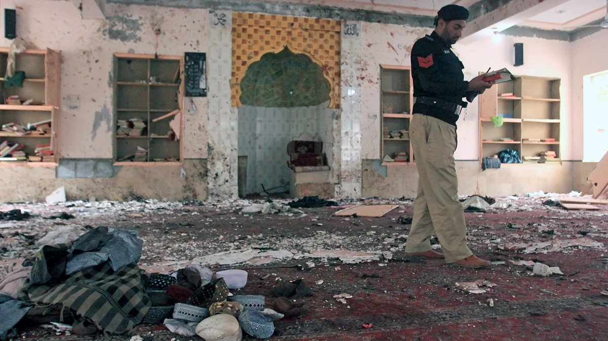A police officer examines the site of Friday’s bomb explosion inside a mosque in Quetta on Jan. 11, 2020. (AP)
