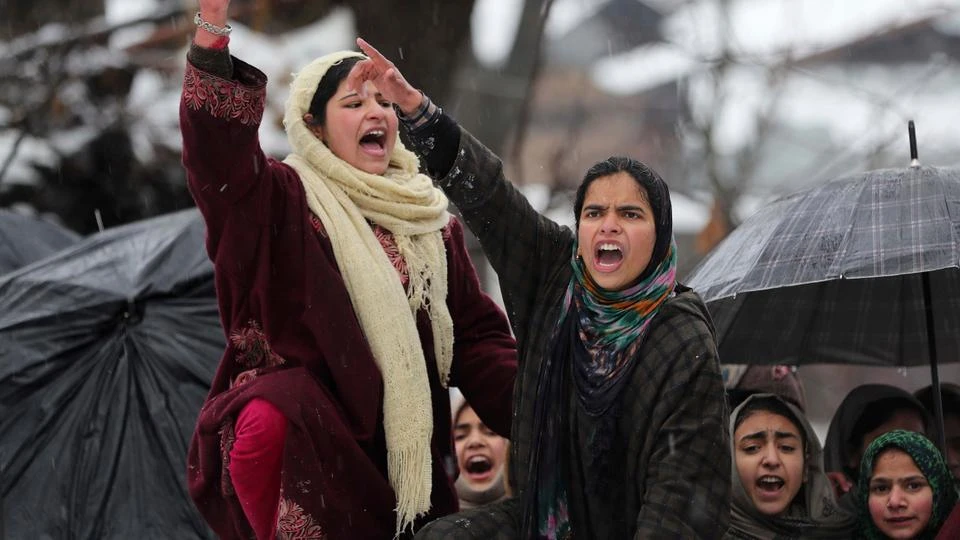 Kashmiri women shout pro-independence slogans during the funeral of top rebel commander Umar Fayaz in village Tral, south of Srinagar, India-administered Kashmir, Monday, Jan 13, 2020. (AP)