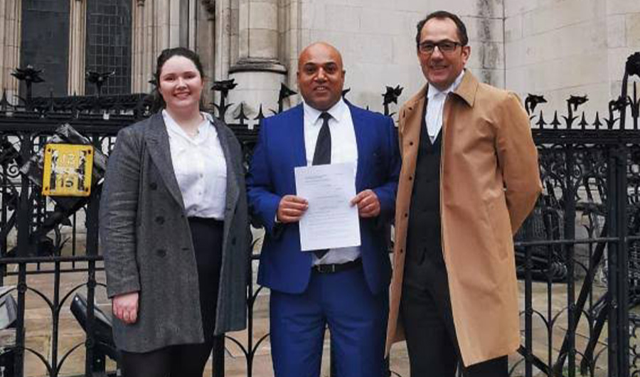 British Pakistani Wajed Iqbal (centre) standing with William Bennett QC and Megan Tolkien of patron Law outside the High Court in London. (Photo courtesy: social media)