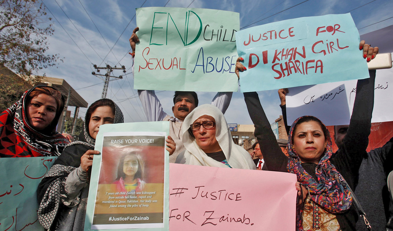 In this file photo, people chant slogans and hold signs to condemn the rape and killing of 7-year-old girl Zainab Ansari in Kasur, during a protest in Peshawar on Jan. 11, 2018. (REUTERS)