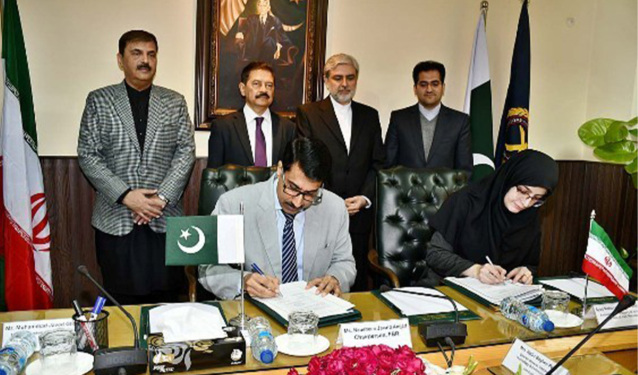 Iranian and Pakistani officials signed MoU for Electronic Exchange of Data in Islamabad on February 10, 2020. (Photo by APP)