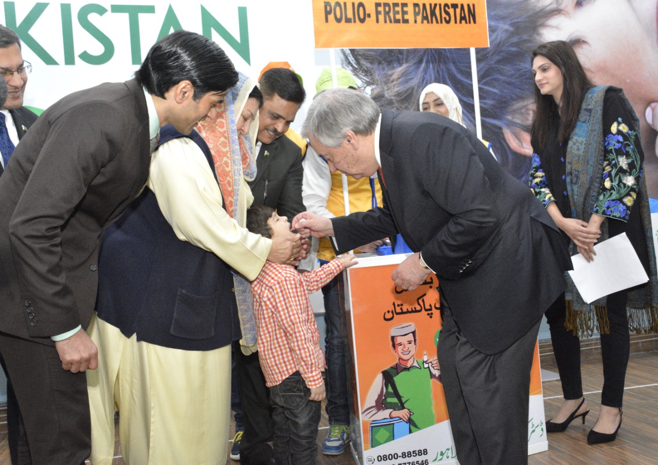 United Nations Secretary General Antonio Guterres administers polio drops to a child at a private school in Lahore on Feb. 18, 2020. (PID)