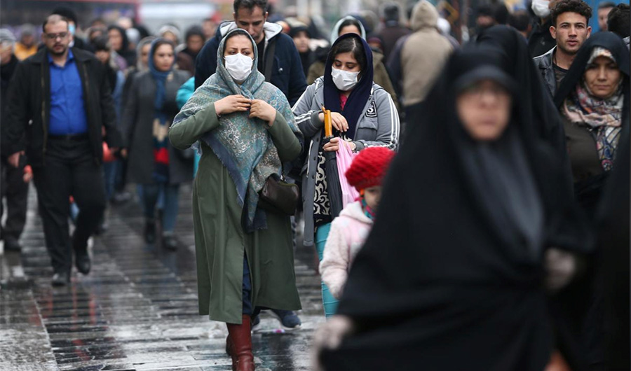 Iranian women wear protective masks to prevent contracting a coronavirus, as they stand at Grand Bazaar in Tehran, Iran February 20, 2020. (West Asia News Agency/ via REUTERS)