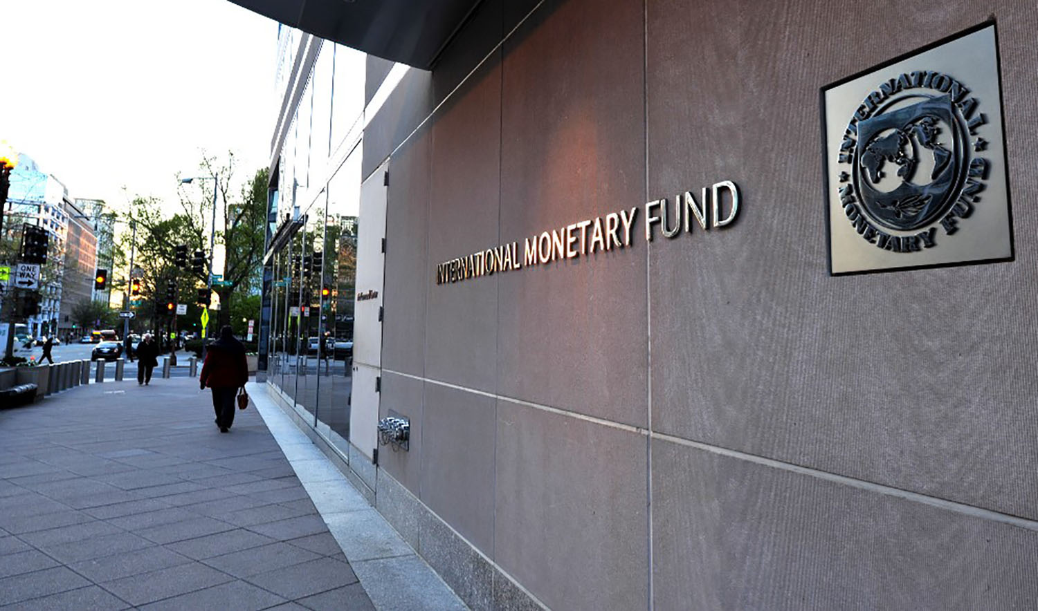 In this file photo, the International Monetary Fund (IMF) building sign is viewed in Washington DC on April 5, 2016. (AFP)