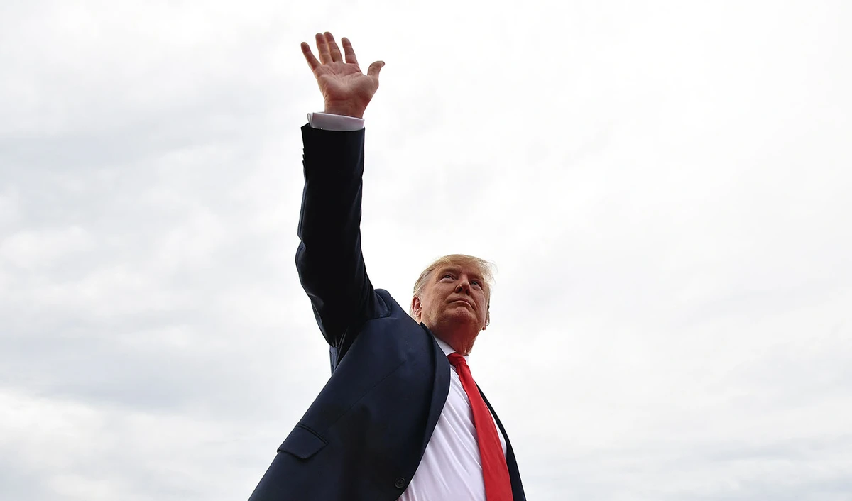In this file photo, US President Donald Trump waves as he leaves after attending the "Salute to America" Fourth of July event at the Lincoln Memorial in Washington DC on July 4, 2019. (AFP)