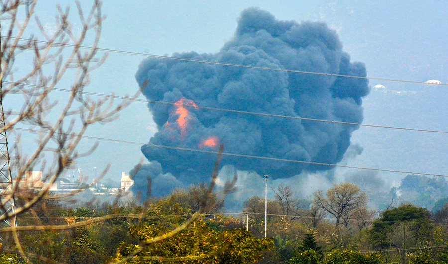 A plume of smoke and fire are seen coming from an area after a Pakistani F-16 crashed during a rehearsal ahead of Pakistan Day military parade in Islamabad on March 11, 2020. (AFP)