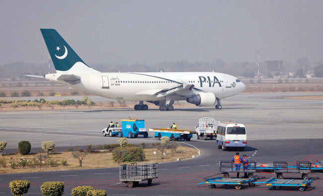 In this file photo, A Pakistan International Airlines plane prepares to take off at Alama Iqbal International Airport in Lahore. (REUTERS)