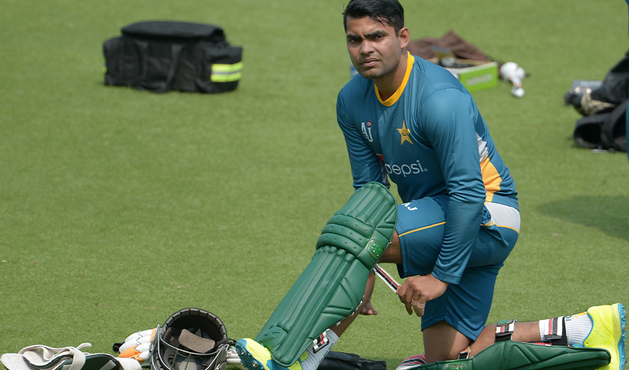 Pakistan's Umar Akmal pads up he takes part in a training session ahead of the World T20 cricket tournament match at The Eden Gardens Cricket Stadium in Kolkata on March 13, 2016. (AFP)