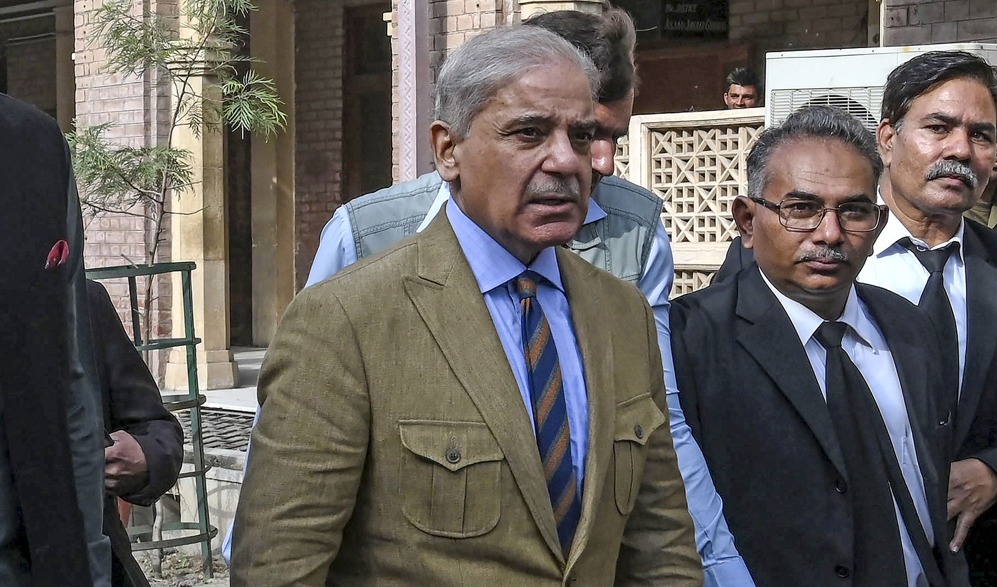 In this file photo, Shahbaz Sharif arrives at the High Court to attend a hearing in Lahore on Nov. 16, 2019, as party had petitioned the Lahore High Court seeking an unconditional end to Nawaz Sharif's travel ban. (AFP)