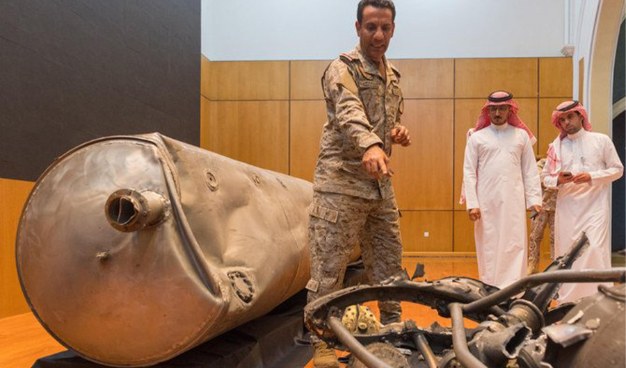 Col. Turki Al-Malki, spokesman of the Saudi-led Arab coalition supporting Yemen's legitimate government, shows to the media on Sunday parts of the Houthi missile that was shot down over Riyadh the night before. (SPA)