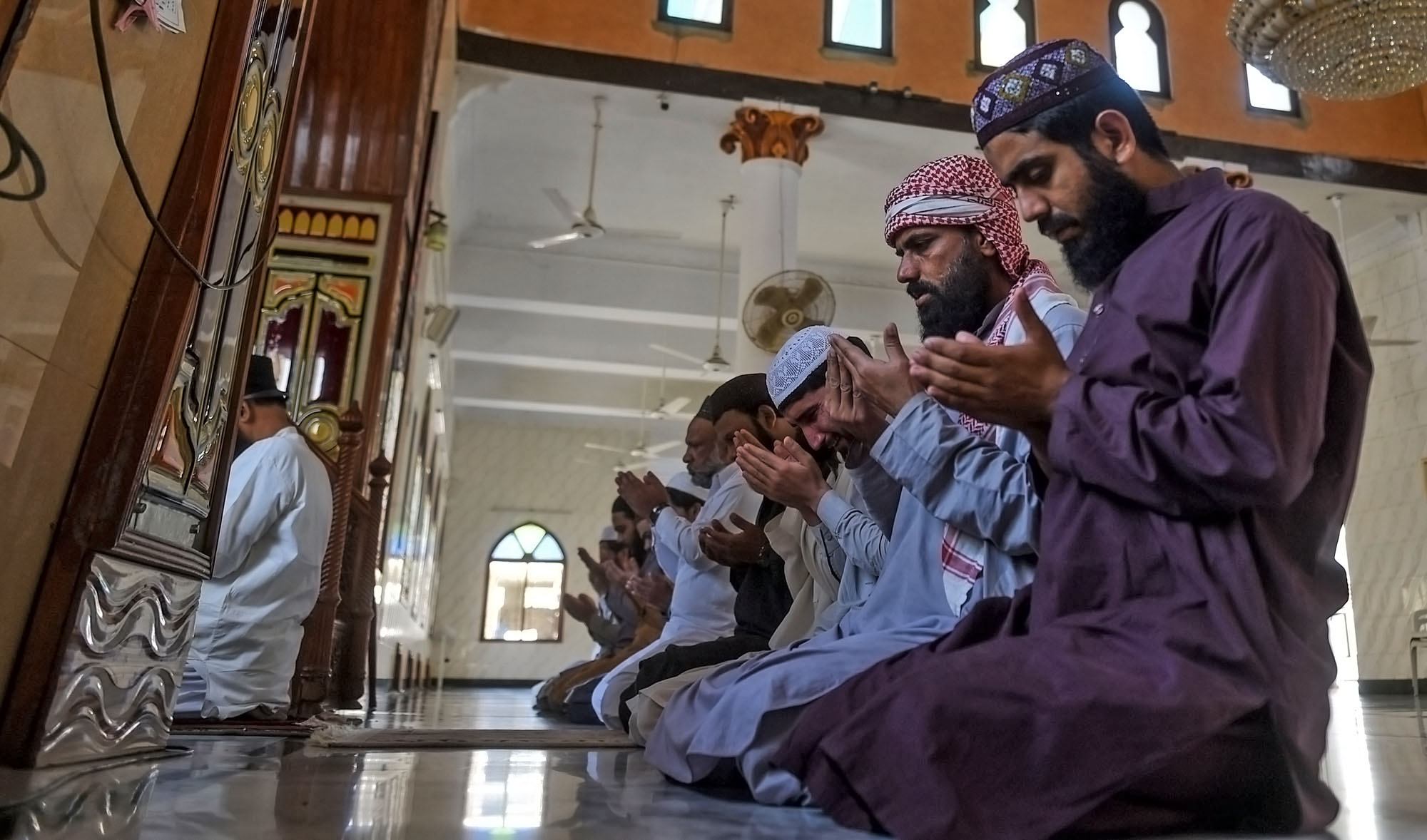 In this file photo, worshippers offer Friday prayers at a mosque during a government-imposed nationwide lockdown as a preventive measure against the COVID-19 coronavirus, in Karachi on March 27, 2020. (AFP)