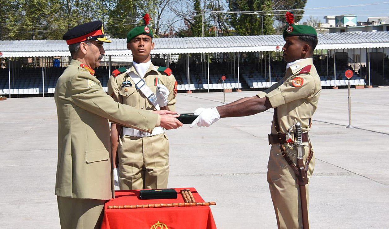 Empty stalls at the PMA graduation in Kakul as Lieutenant General Sher Afgan hands awards to cadets on April 4, 2020. For the first time in Pakistan's history, no guests were invited to the passing out parade due to the coronavirus outbreak. (Photo courtesy: ISPR)