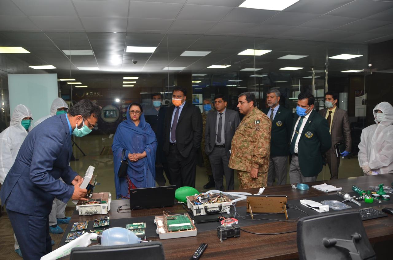 Pakistan’s Minister for Defence Production, Zubaida Jalal, witnesses the engineers of National Radio and Telecommunication Corporation (NRTC) repairing ventilators in Haripur on April 8, 2020. (Courtesy: Ministry of Defence Production)