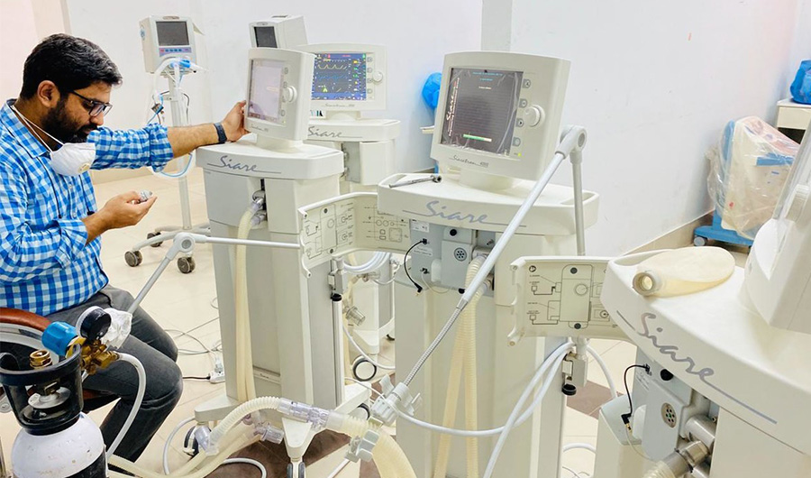 In this photo an engineer in Engineers of National Radio and Telecommunication Corporation (NRTC) is seen inspecting ventilators in Haripur on April 8, 2020. (Courtesy: Ministry of Defence Production)