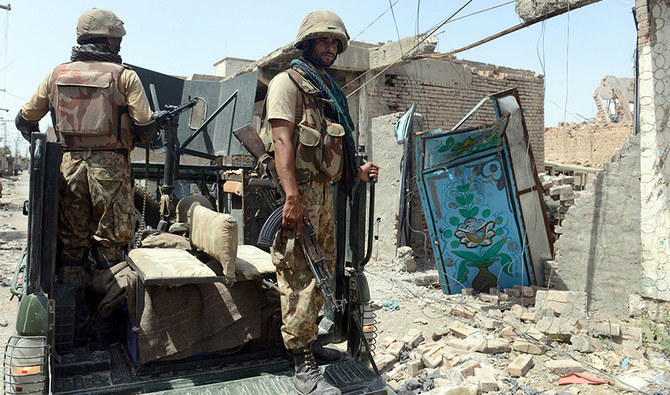 This photograph taken on July 9, 2014 shows Pakistani soldiers patrol during a military operation against Taliban militants, in the main town of Miramnshah in North Waziristan. (File/ AFP)