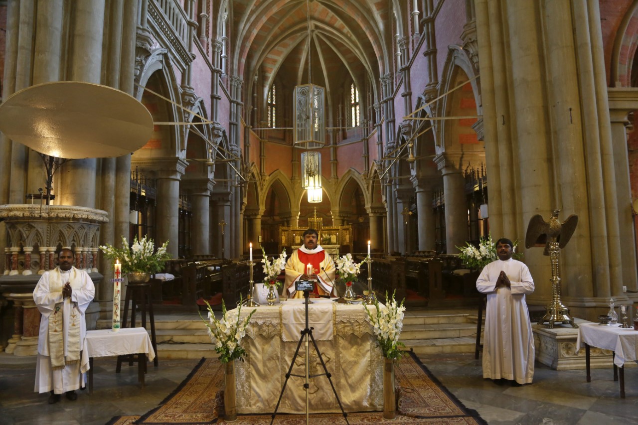 Rev. Shahid Mehraj, center, leads an Easter Mass live-streamed from Cathedral Church of the Resurrection due to a government-imposed lockdown to help stop the spread of the new coronavirus, in Lahore, Pakistan, Sunday, April 12, 2020. (AP)