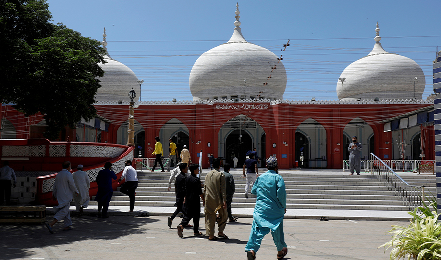 FILE PHOTO: Muslims run to join others for Friday prayer, despite lockdown after Pakistan shut all markets, public places and discouraged large gatherings amid an outbreak of coronavirus disease (COVID-19), in Karachi, Pakistan March 27, 2020. (REUTERS)