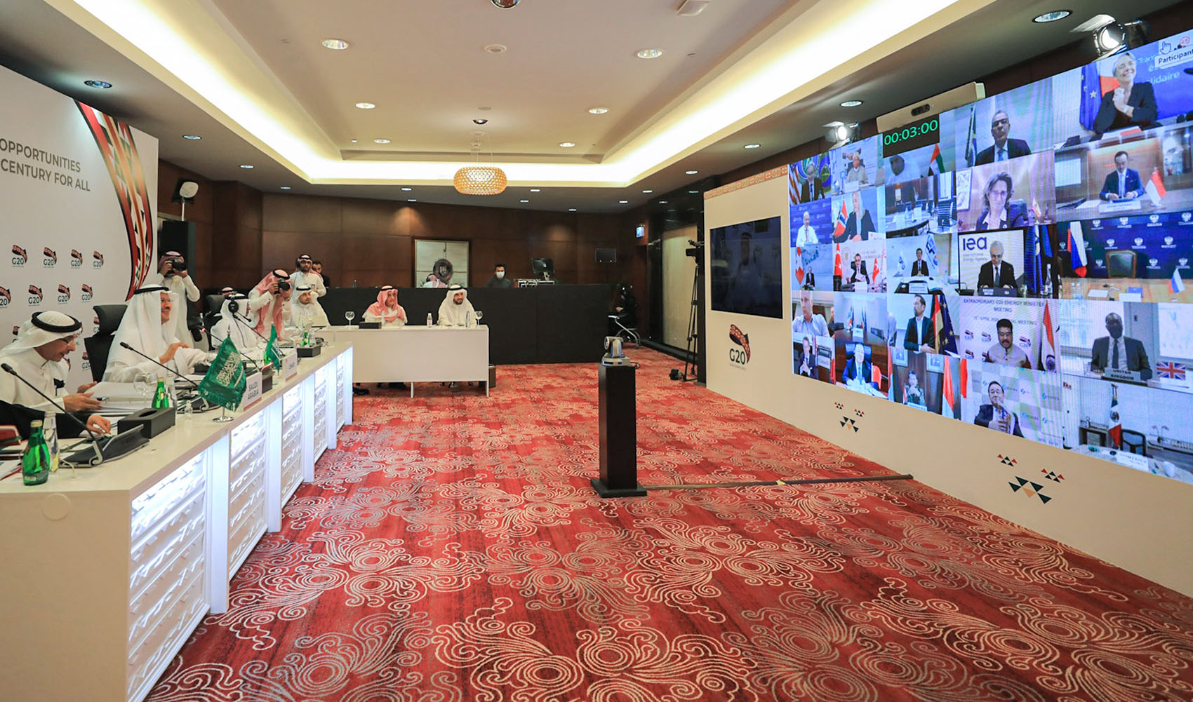 A handout photo released by the Saudi Energy Ministry on April 10, 2020 shows Saudi Arabia's Energy Minister Abdulaziz bin Salman, second left, chairing a virtual extraordinary meeting of G20 Oil ministers Riyadh. (Saudi Arabia's Ministry of Energy via AFP)