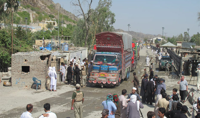 Trucks carrying goods and heading to Afghanistan are seen parked along the Torkham border on July 6, 2019. (AN Photo)