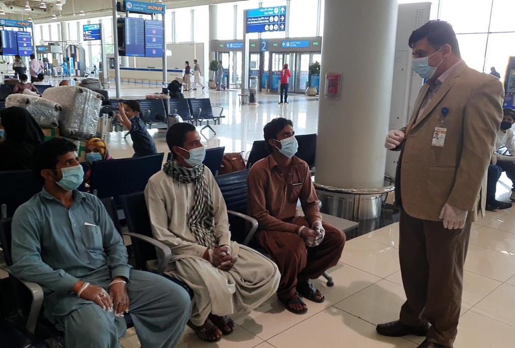 Passengers wait for a special PIA flight from Dubai to Islamabad on April 18, 2020. (Photo courtesy: Ministry of Overseas Pakistanis)