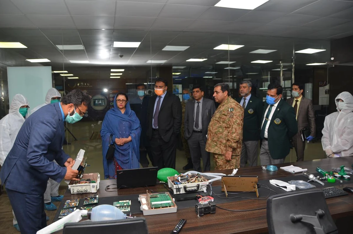 Pakistan’s Minister for Defence Production, Zubaida Jalal, witnesses the engineers of National Radio and Telecommunication Corporation (NRTC) repairing ventilators in Haripur on April 8, 2020. (Courtesy: Ministry of Defence Production)