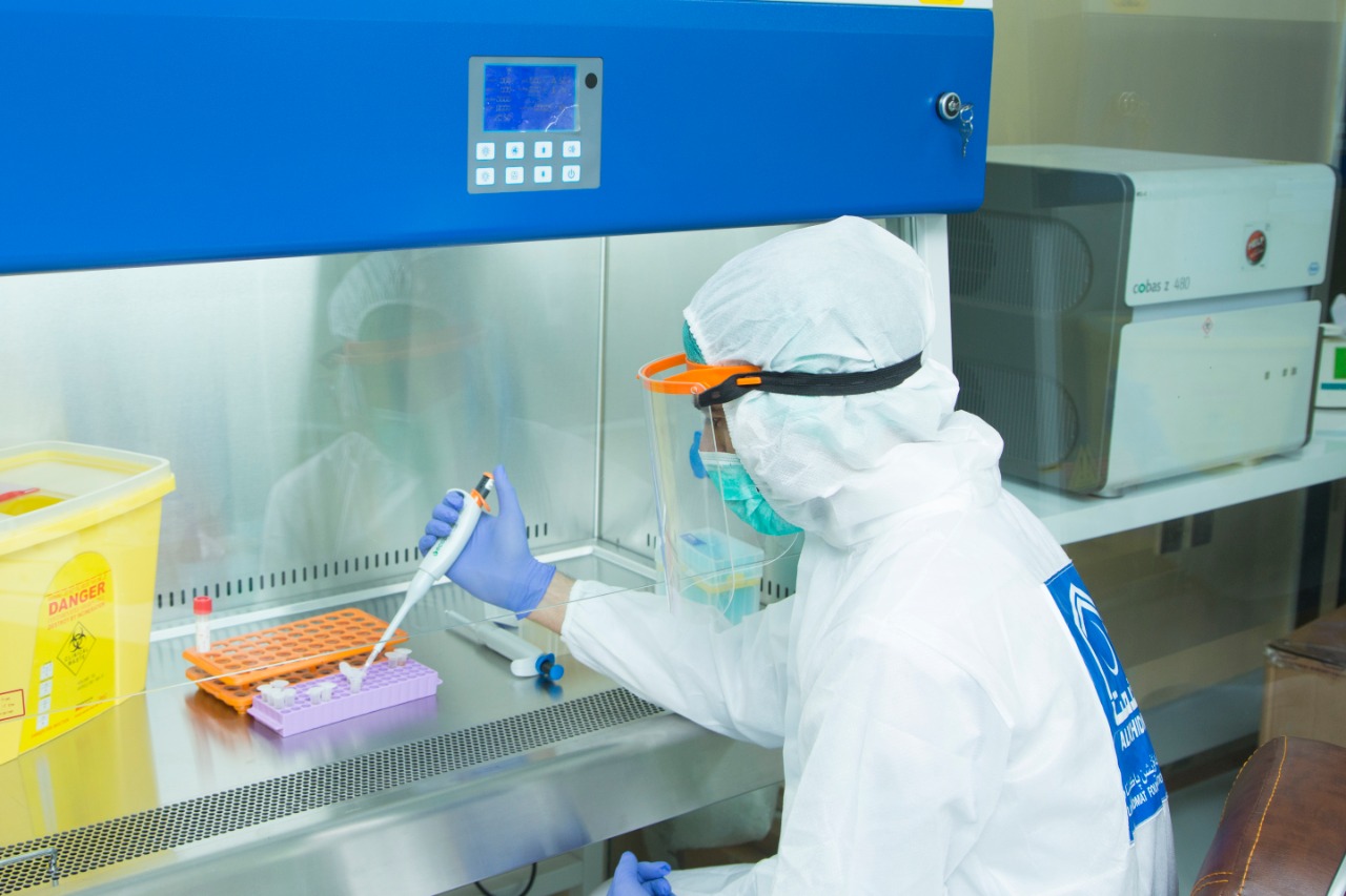 A technician is seen at work at the Al-Khidmat COVID-19 testing lab, which was opened in Lahore on May 3, 2020. (Photo courtesy: Al-Khidmat)