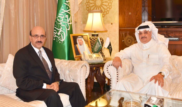 This undated file photo shows Azad Jammu and Kashmir President Masood Khan, left, with Saudi Ambassador to Pakistan Nawaf bin Saeed Al-Malki. (SPA)
