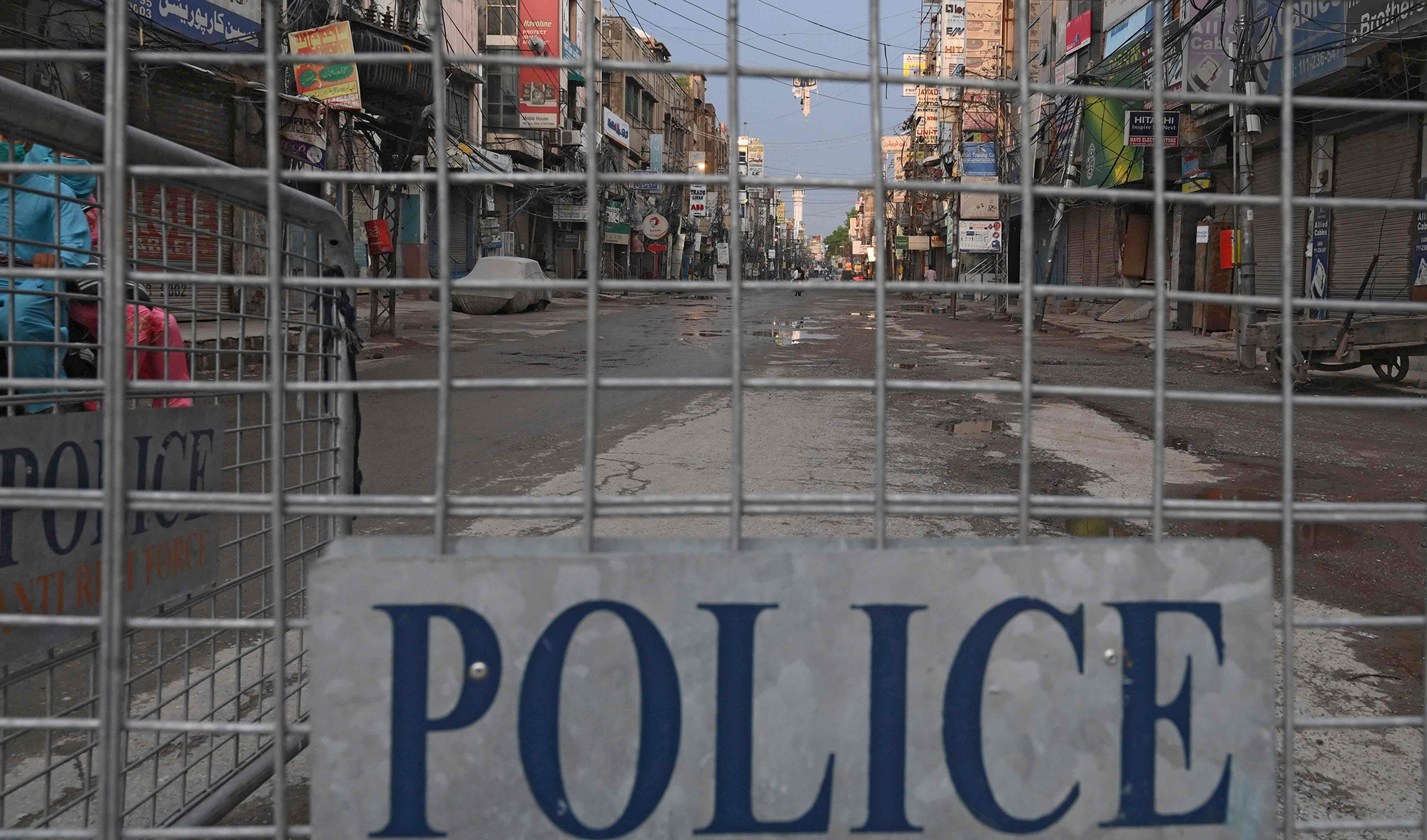 An empty street is seen during a government-imposed nationwide lockdown as a preventive measure against the COVID-19 coronavirus, in Lahore on May 3, 2020. (AFP)