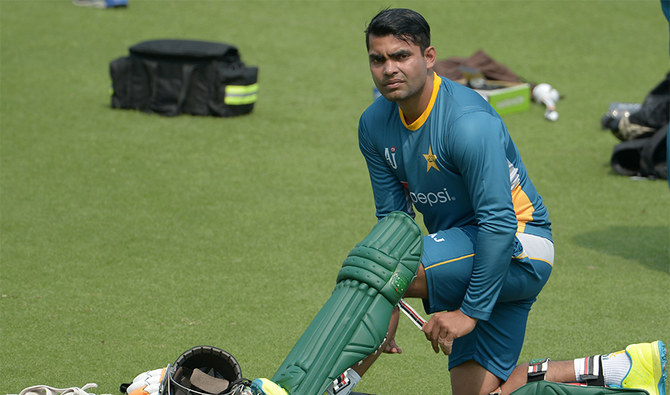 Pakistan's Umar Akmal pads up he takes part in a training session ahead of the World T20 cricket tournament match at The Eden Gardens Cricket Stadium in Kolkata on March 13, 2016. (AFP)