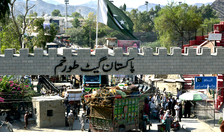 In this photograph taken on September 7, 2016, a truck carrying the belongings of a repatriated Afghan refugee family crosses the border into Afghanistan at the Torkham crossing point in Pakistan's tribal Khyber district. (AFP)
