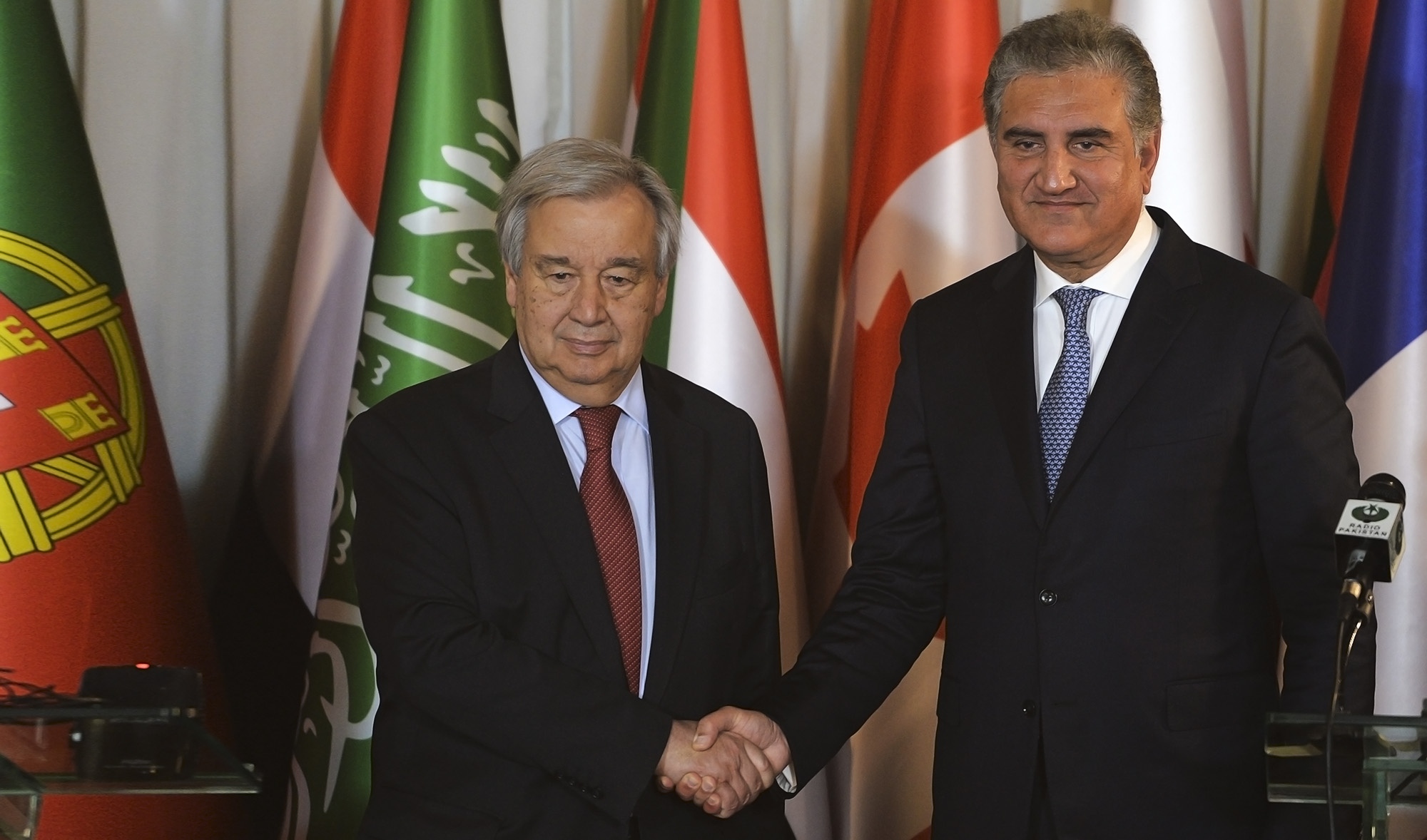 United Nations Secretary-General Antonio Guterres, left, shakes hands with Pakistan's Foreign Minister Shah Mahmood Qureshi after a joint press conference at the Foreign Ministry in Islamabad on Feb. 16, 2020. (AFP/File)