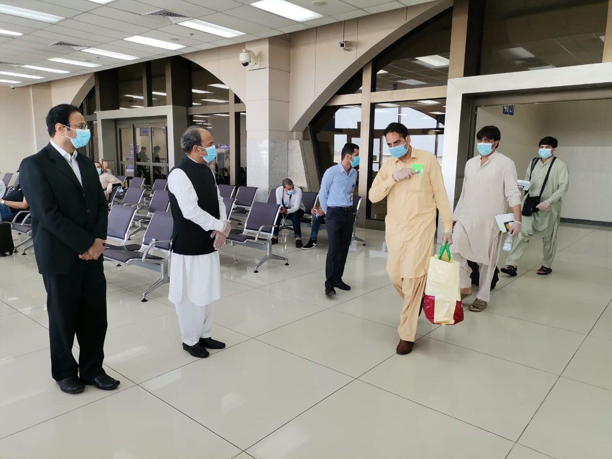 Pakistani nationals wait for a special flight to Karachi at Jeddah’s King Abdulaziz International Airport on May 31, 2020. (Photo courtesy: Pakistan Consulate General in Jeddah)