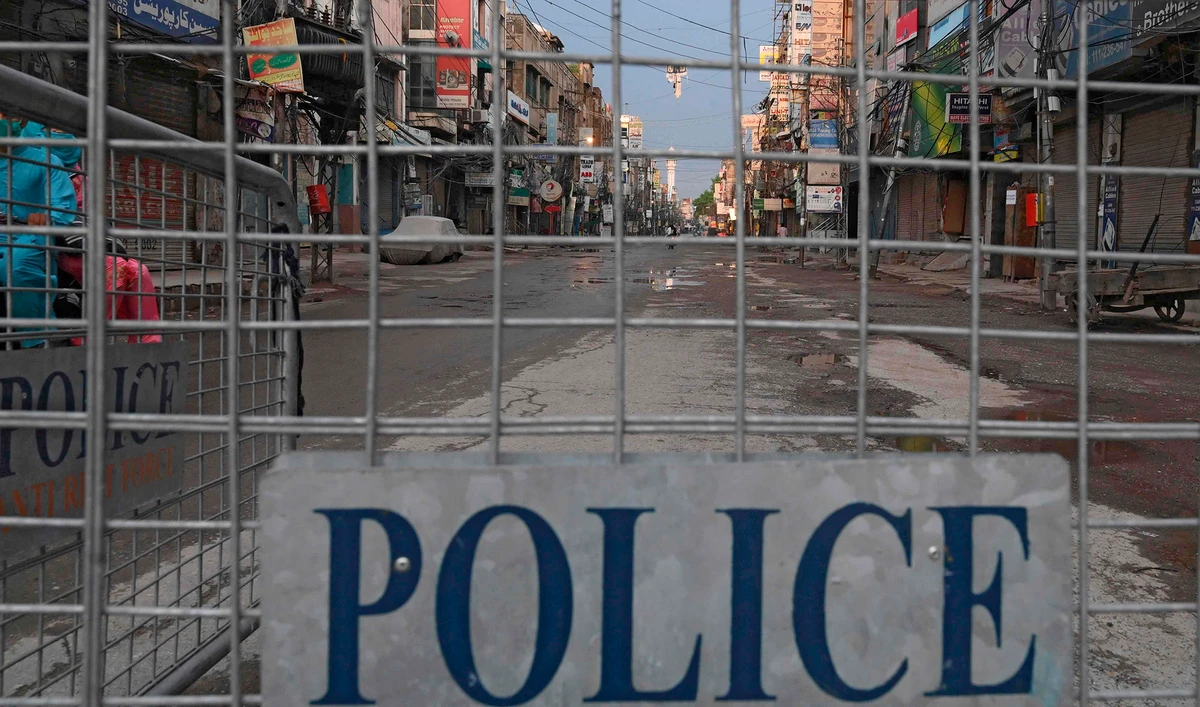 An empty street is seen during a government-imposed nationwide lockdown as a preventive measure against the COVID-19 coronavirus, in Lahore on May 3, 2020. (AFP)