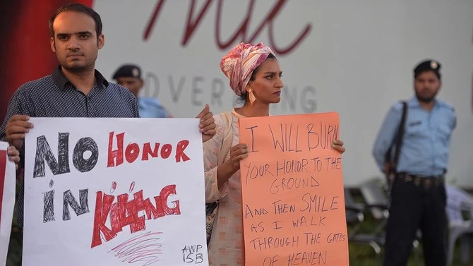 Pakistani civil society activists carry placards during a protest against Honor Killings in Islamabad on July 18, 2016. (AFP/File)