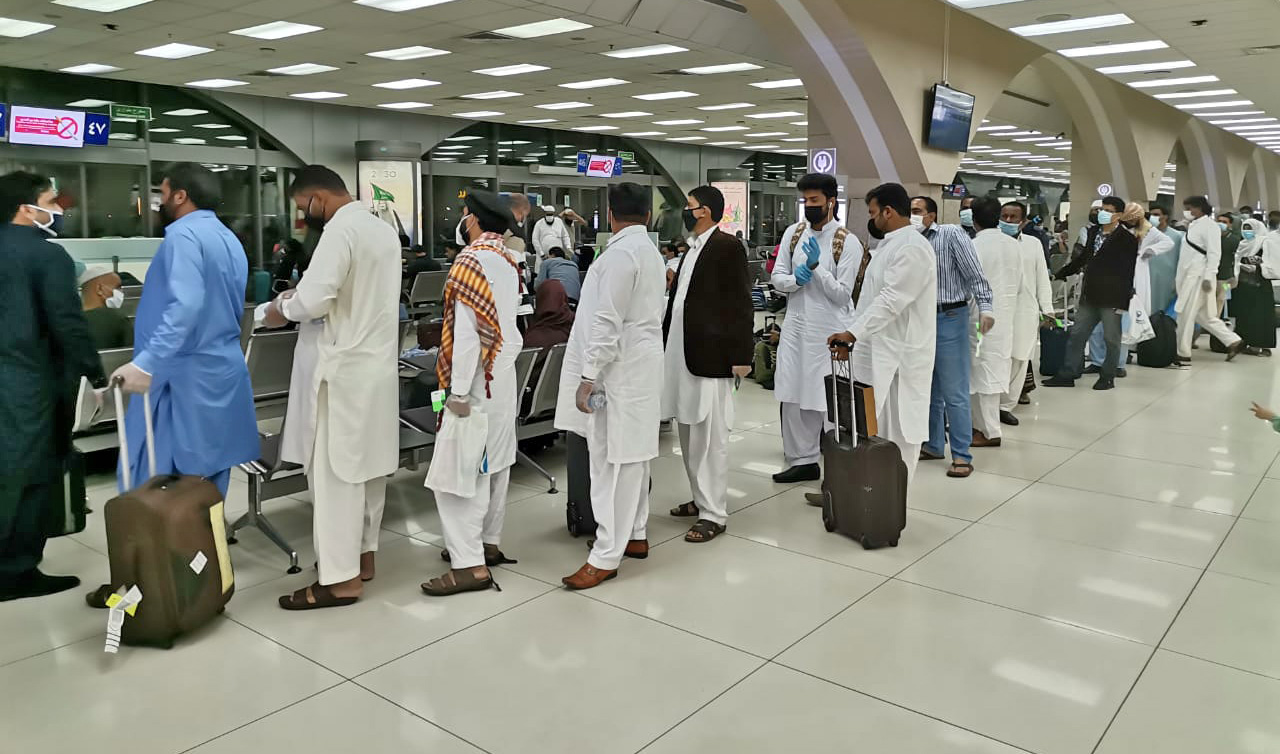 Pakistani nationals stranded in Saudi Arabia are processing their travel documents for a special flight to Karachi at Jeddah International Airport on June 07, 2020. (Photo courtesy: Pakistan Consulate General in Jeddah)