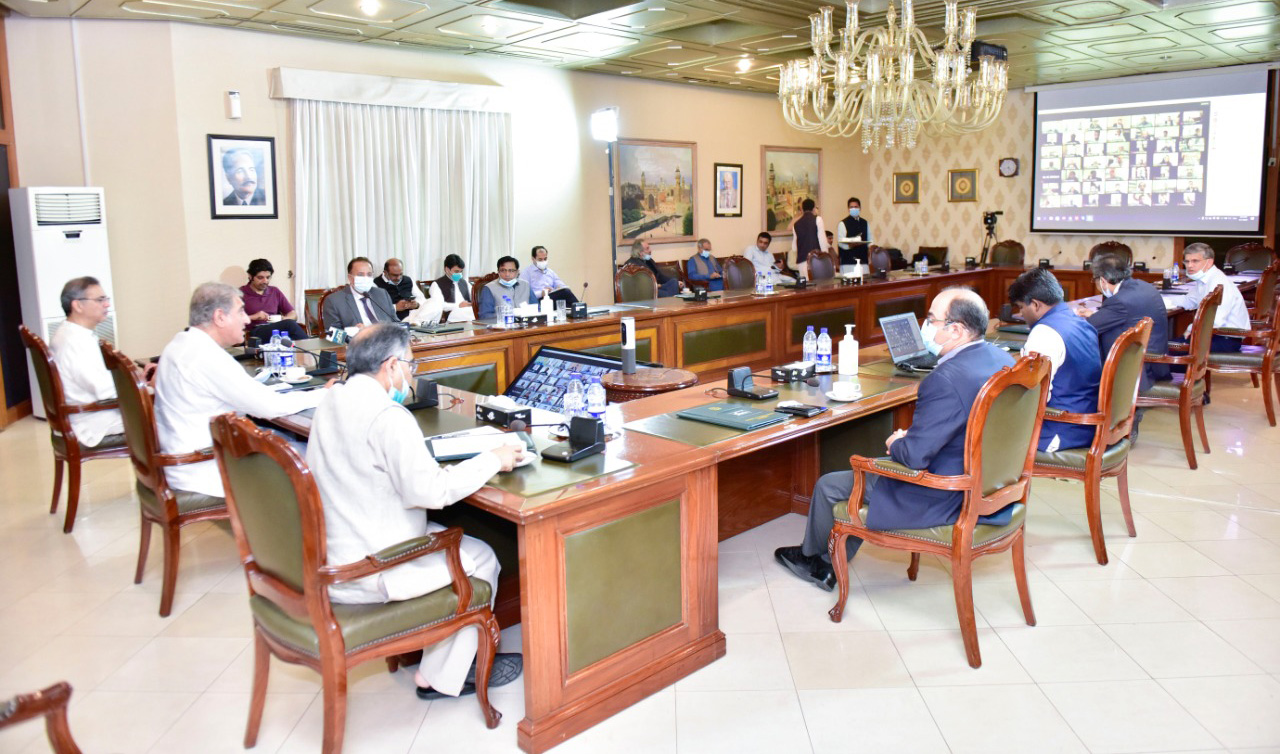 Pakistan's foreign minister Shah Mahmood Qureshi, second left, along with other officials during a town hall meeting with overseas Pakistanis based in the United Arab Emirates (UAE) on June 7, 2020. (PID)