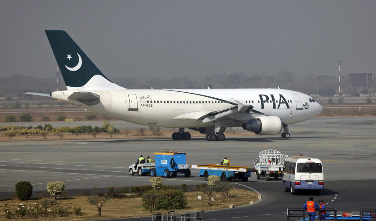 In this file photo, a Pakistan International Airlines (PIA) plane prepares to take-off at Alama Iqbal International Airport in Lahore on Feb. 1, 2012. (REUTERS)