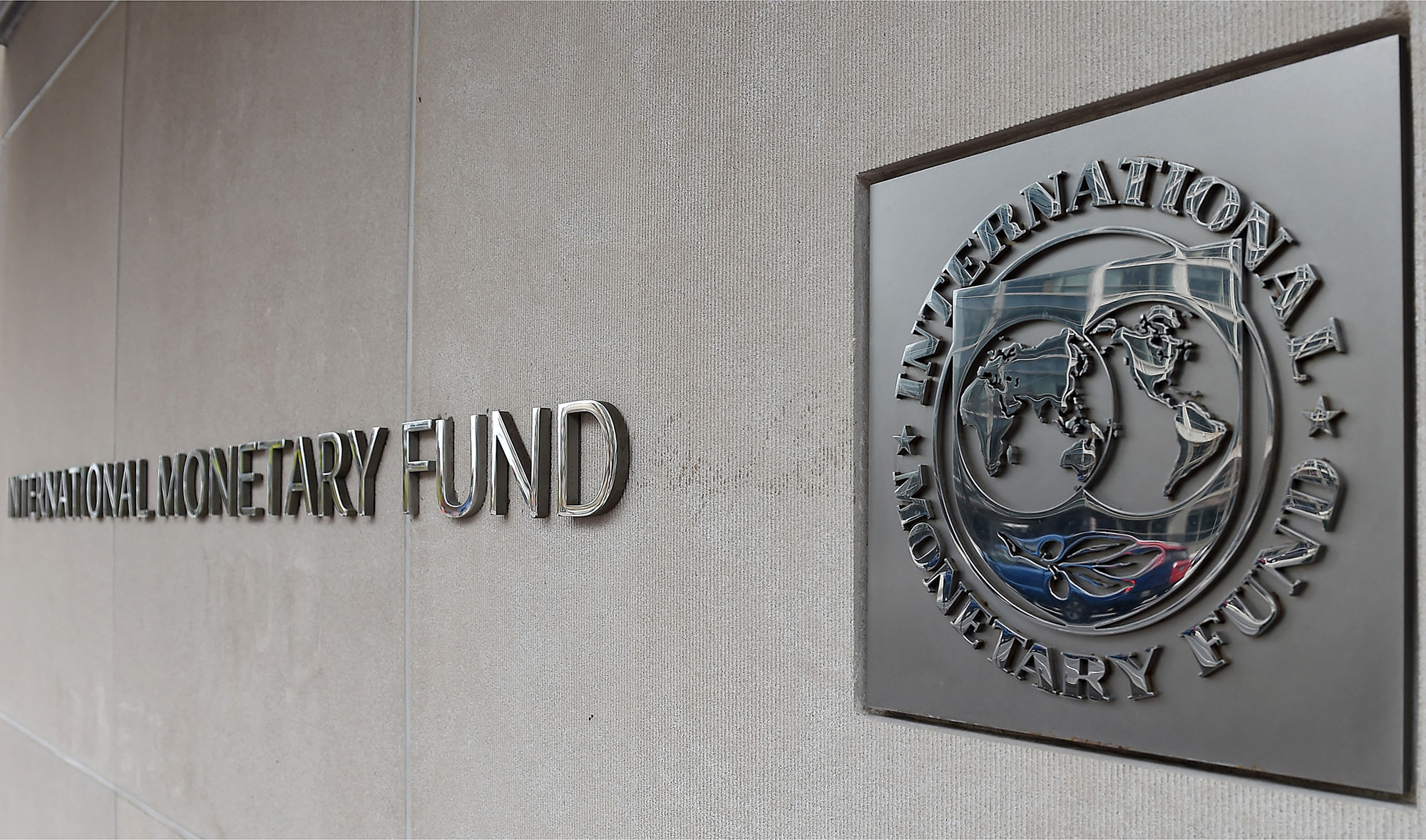 This file photo captured on on March 27, 2020 shows an exterior of the International Monetary Fund (IMF) Headquarters in Washington DC. (AFP)