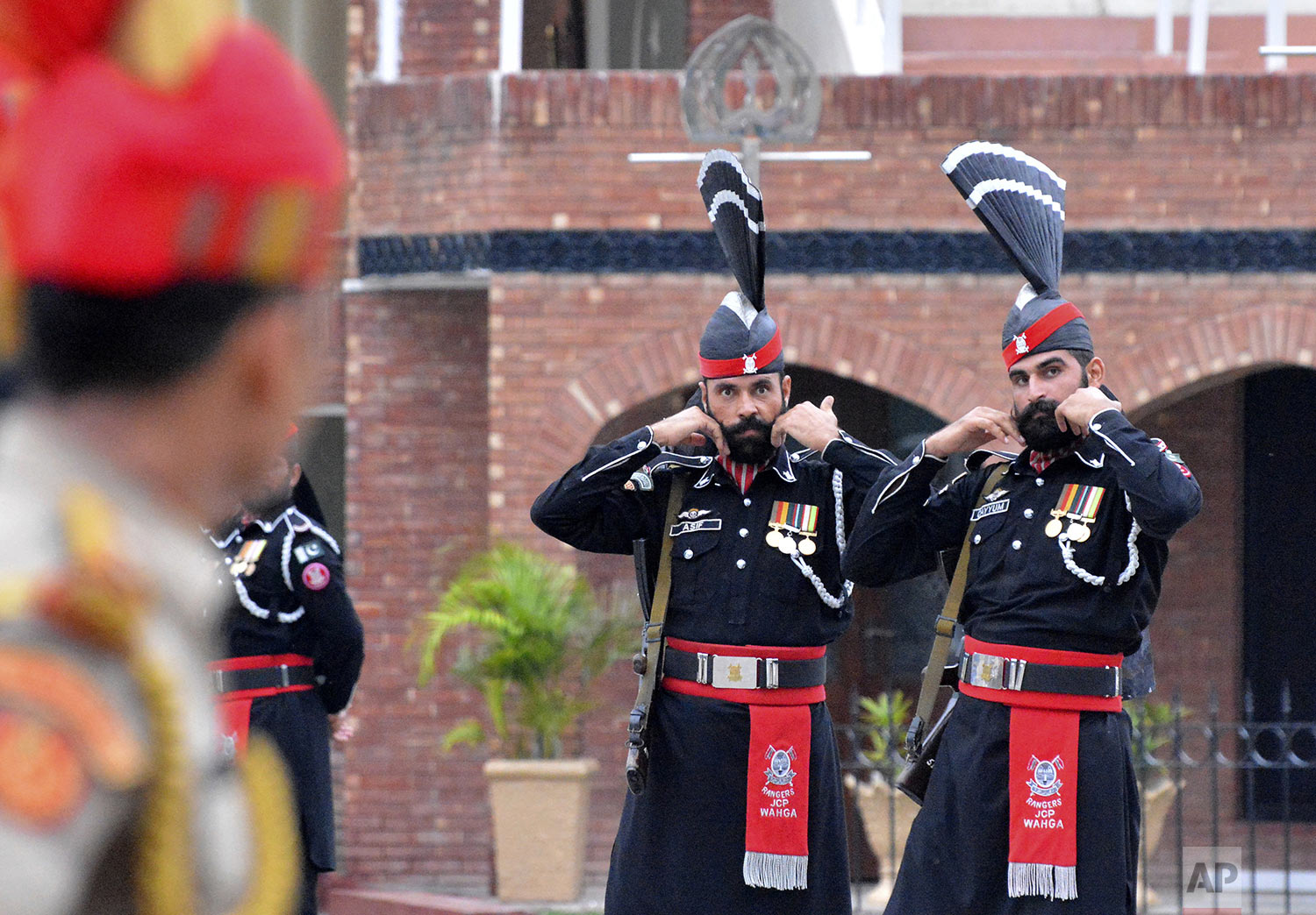 Pakistan Rangers soldiers face Indian Border Security Force soldiers at a daily closing ceremony on the Indian side of the Attari-Wagah border, Friday, Aug. 9, 2019. (AP/ File Photo)