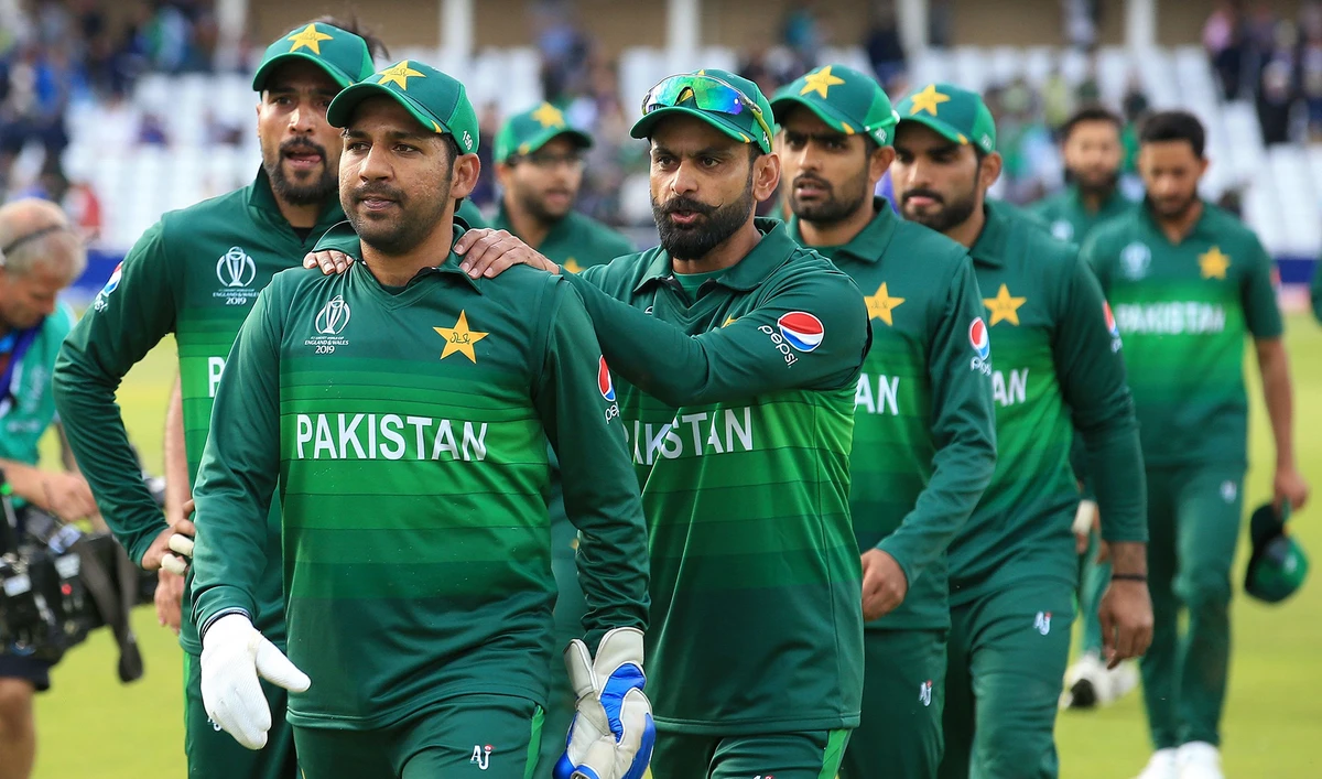 In this file photo, Pakistan's captain Sarfaraz Ahmed, second left, leads his team off of the pitch after winning the 2019 Cricket World Cup group stage match between England and Pakistan at Trent Bridge in Nottingham, central England, on June 3, 2019. (AFP)