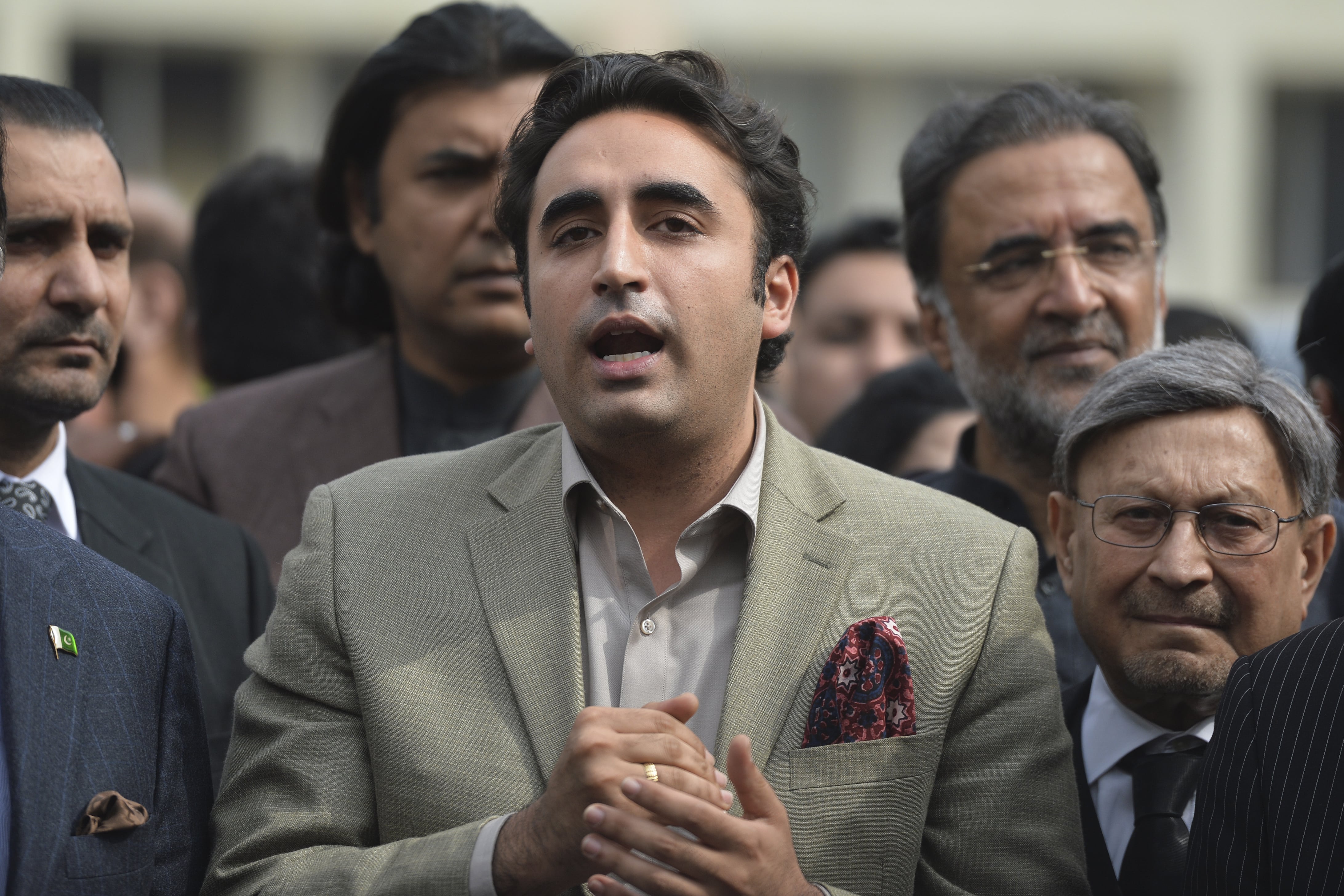 Chairman of Pakistan Peoples Party (PPP) Bilawal Bhutto (C) speaks to the media after appearing before the National Accountability court in relation to a fake bank accounts case, in Islamabad on February 13, 2020. (AFP)