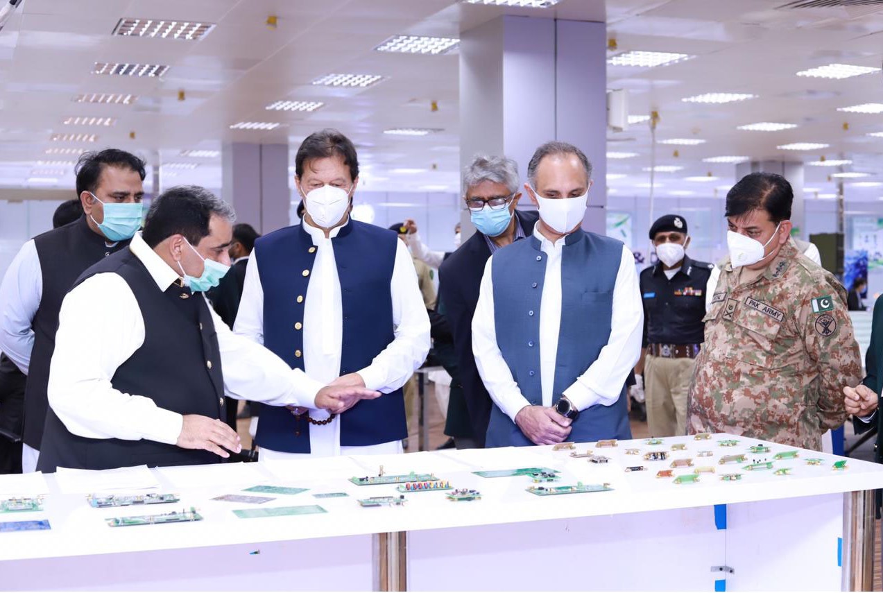 Prime Minister Imran Khan, center, inaugurates Pakistan's first facility to produce ventilators at the National Radio and Telecommunication Corporation (NRTC) in Haripur, Khyber Pakhtunkhwa, on July 6, 2020. (PID)