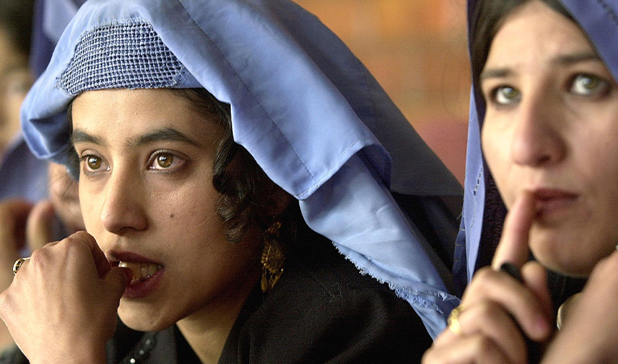 In this file photo, Afghan students await registration for classes at Kabul University on Dec. 1, 2001. (AFP/File)