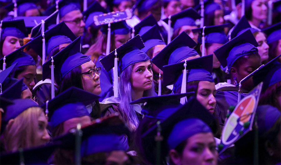 In this file photo, Hunter College graduates listen as U.S. Secretary of State Hillary Clinton delivers the commencement address at the Hunter College Commencement ceremony at Madison Square Garden, May 29, 2019 in New York City. (AFP)