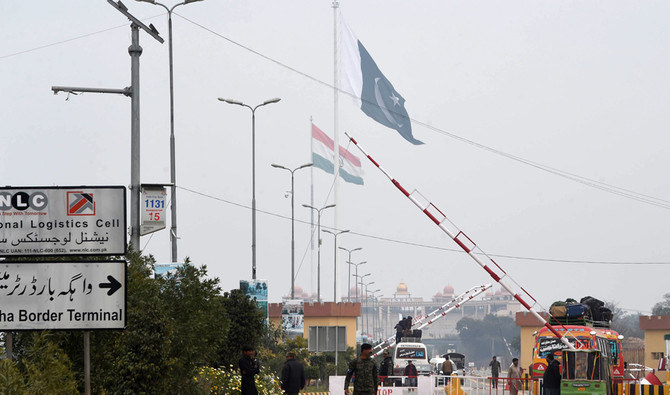 Pakistani paramilitary soldiers walk at a check post near the India and Pakistan border on the Pakistani side of the Wagah border on Mar. 1, 2019. (AFP)
