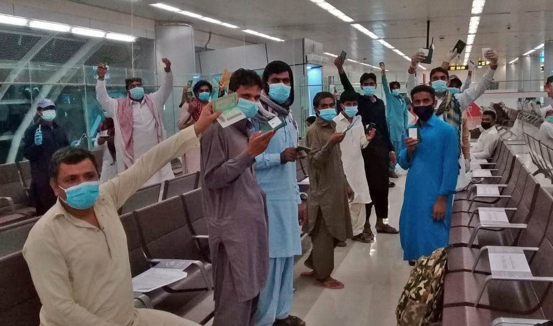 A group of stranded Pakistanis at Sharjah International Airport before leaving for Pakistan from UAE on a chartered flight on Thursday (pic supplied by Taimoor H.)