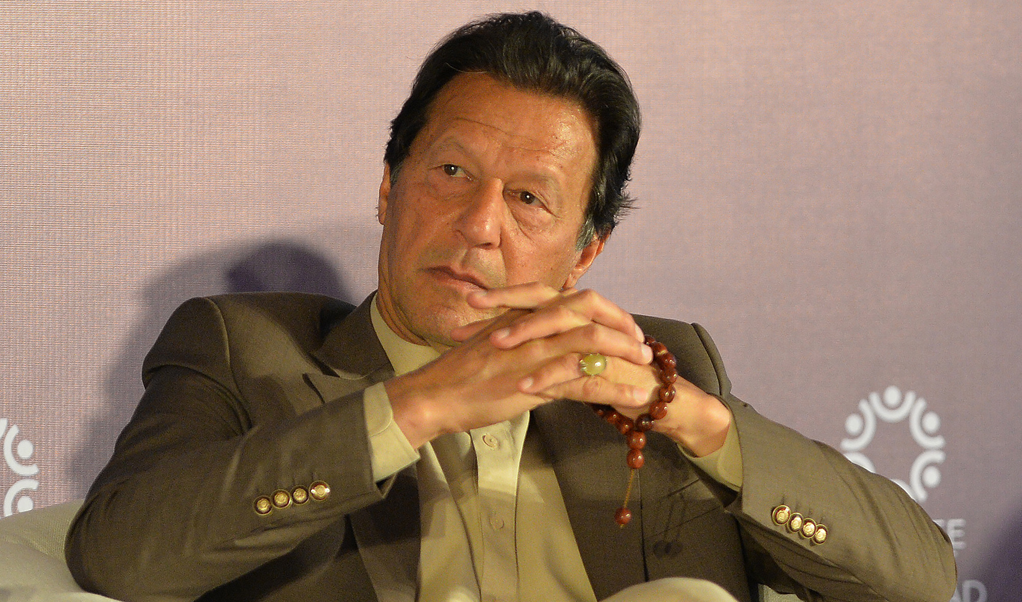 In this file photo, Pakistan's Prime Minister Imran Khan attends the Refugee Summit Islamabad to mark 40 years of hosting Afghan refugee in Islamabad on Feb. 17, 2020. (AFP)